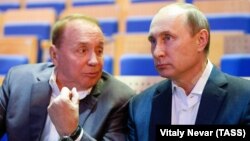 Александр Масляков и Владимир Путин