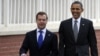 France -- Russian President Dmitry Medvedev (L) and his US counterpart Barack Obama walk towards the crowd at the Villa Le Cercle in Deauville, 26May2011