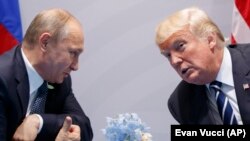 Встреча президентов России и США - Владимира Путина и Дональда Трампа в июле 2017 года (архивное фото)