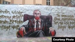 Граффити Владимира Путина в Берлине 