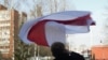 Belarus - Syarhey Kavalenka raised the flag near the court's building, 20apr2010